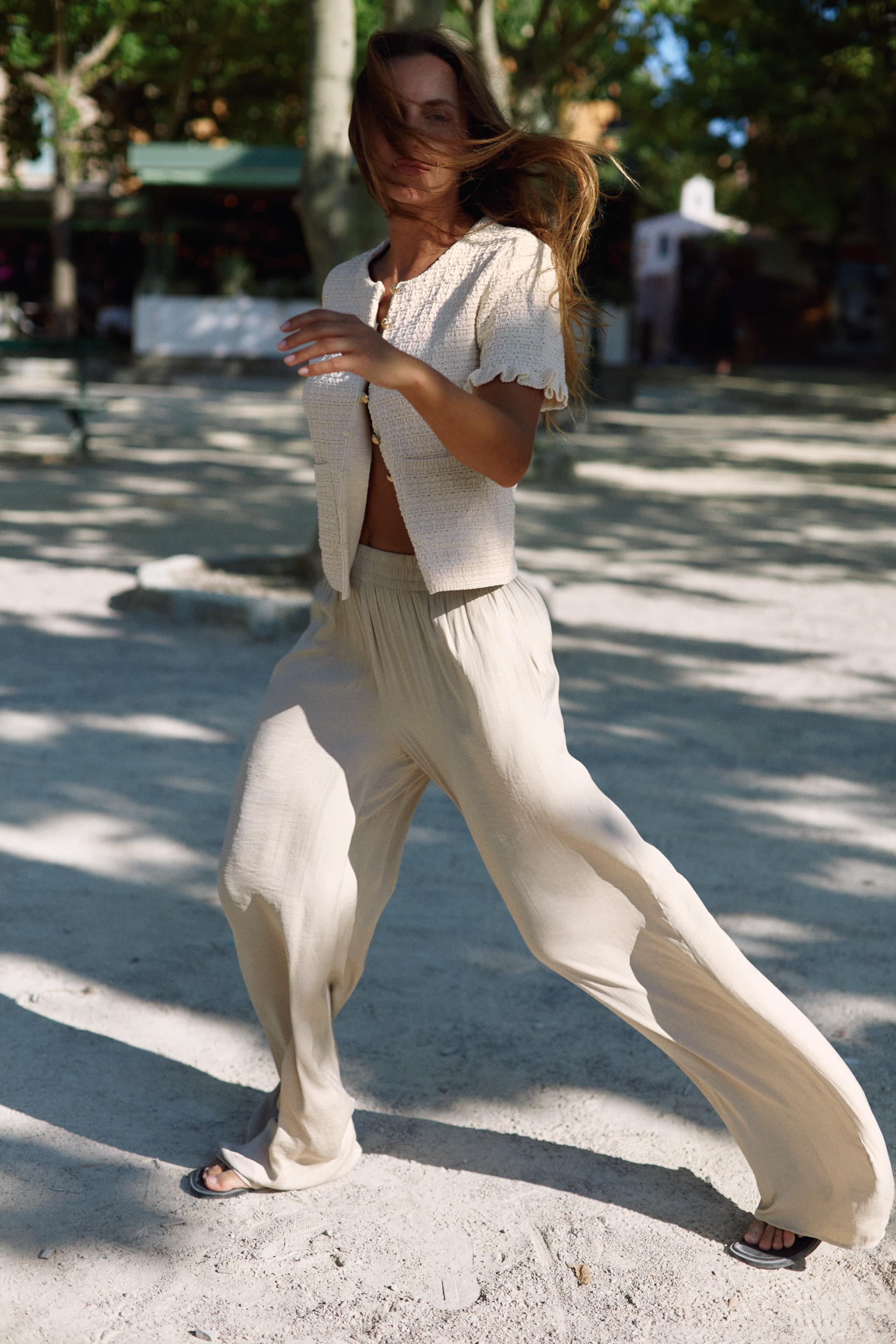 RUFFLED KNIT CARDIGAN